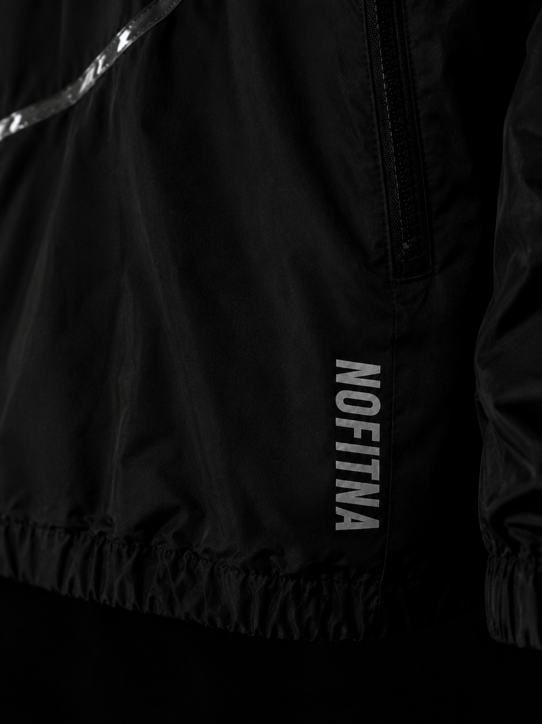 Wordmark NO FITNA réfléchissant, détail