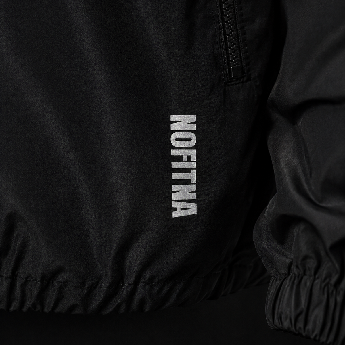 Wordmark NO FITNA réfléchissant, détail