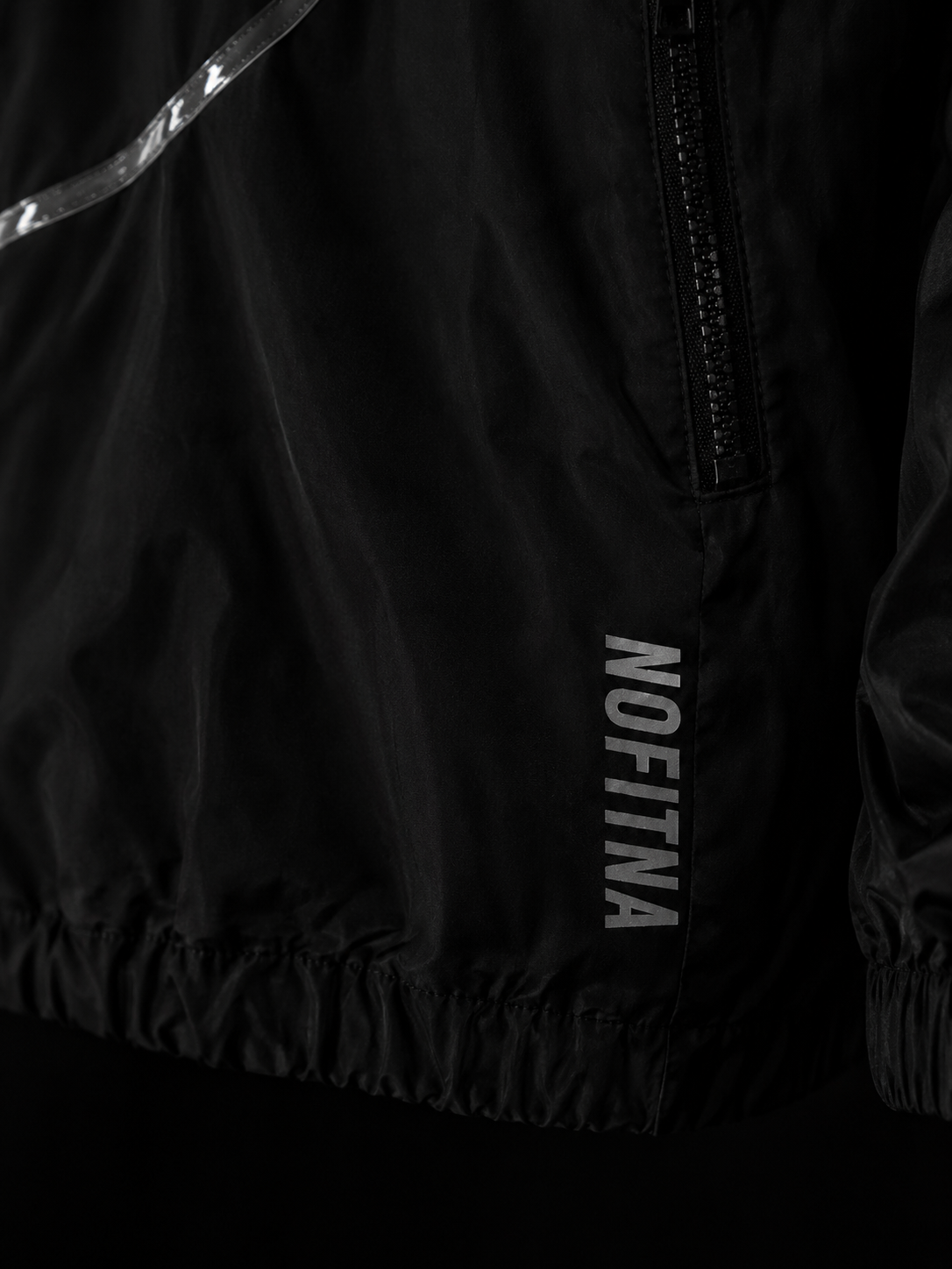 Wordmark NO FITNA réfléchissant, détail